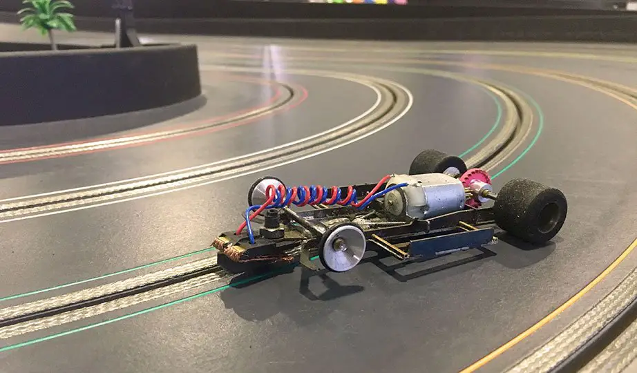 Read more about the article Decoding The Mechanics: How Does Slot Car Racing Work?